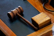 Iowa House Speaker Pat Grassley's gavel sits on the speakers' desk, Monday, March 16, 2020, at the Statehouse in Des Moines, Iowa.  Iowa leaders are suspending the current legislative session for at least 30 days in efforts to prevent the spread of COVID-19 coronavirus. (AP Photo/Charlie Neibergall)
