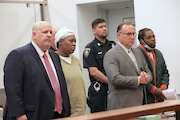 Defendants Leonard Thompson, far right, and Jenice Lightfoot appeared Thursday in Criminal Court, facing charges in the death of their infant boy in West Brighton. They're represented in the case by attorneys Louis Gelormino, far left, and Mark J. Fonte.  (Staten Island Advance)