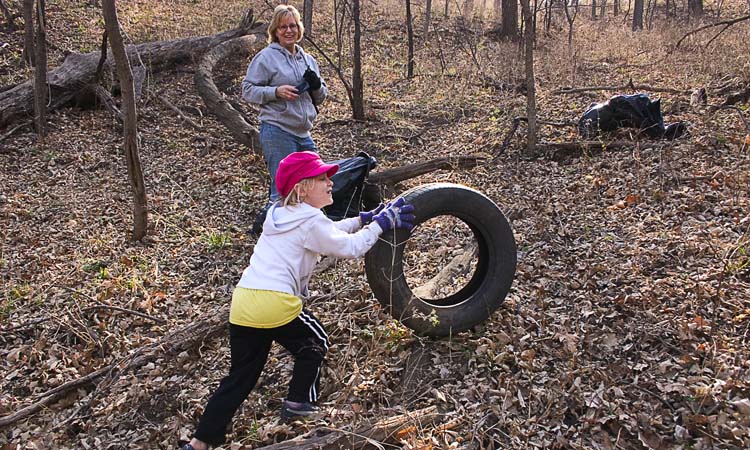 Roots and Shoots volunteer gaining momentum with her tire